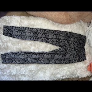 3 pair of leggings, snake prints, purple , & khaki